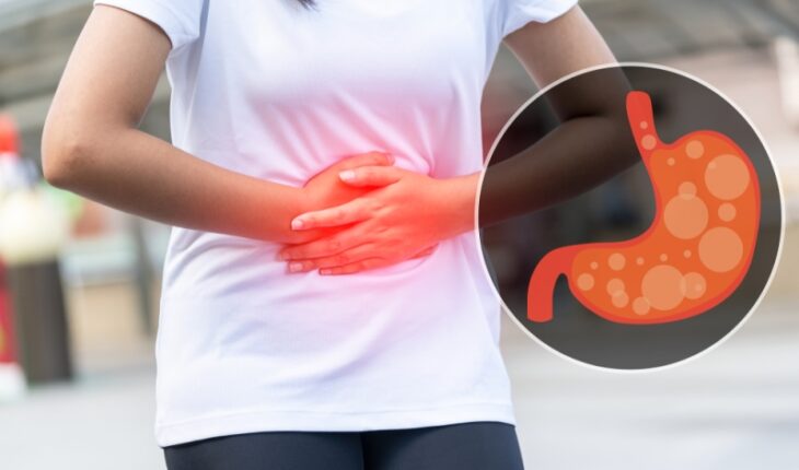 Close up of body woman Suffering from stomach painful or Acid Reflux or Heartburn,Gas,Bloating,Belching and flatulence or gastrointestinal system disease. people,medical and health insurance concept